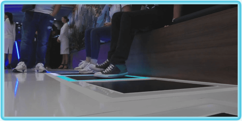 Pressure-sensitive interactive floor tiles